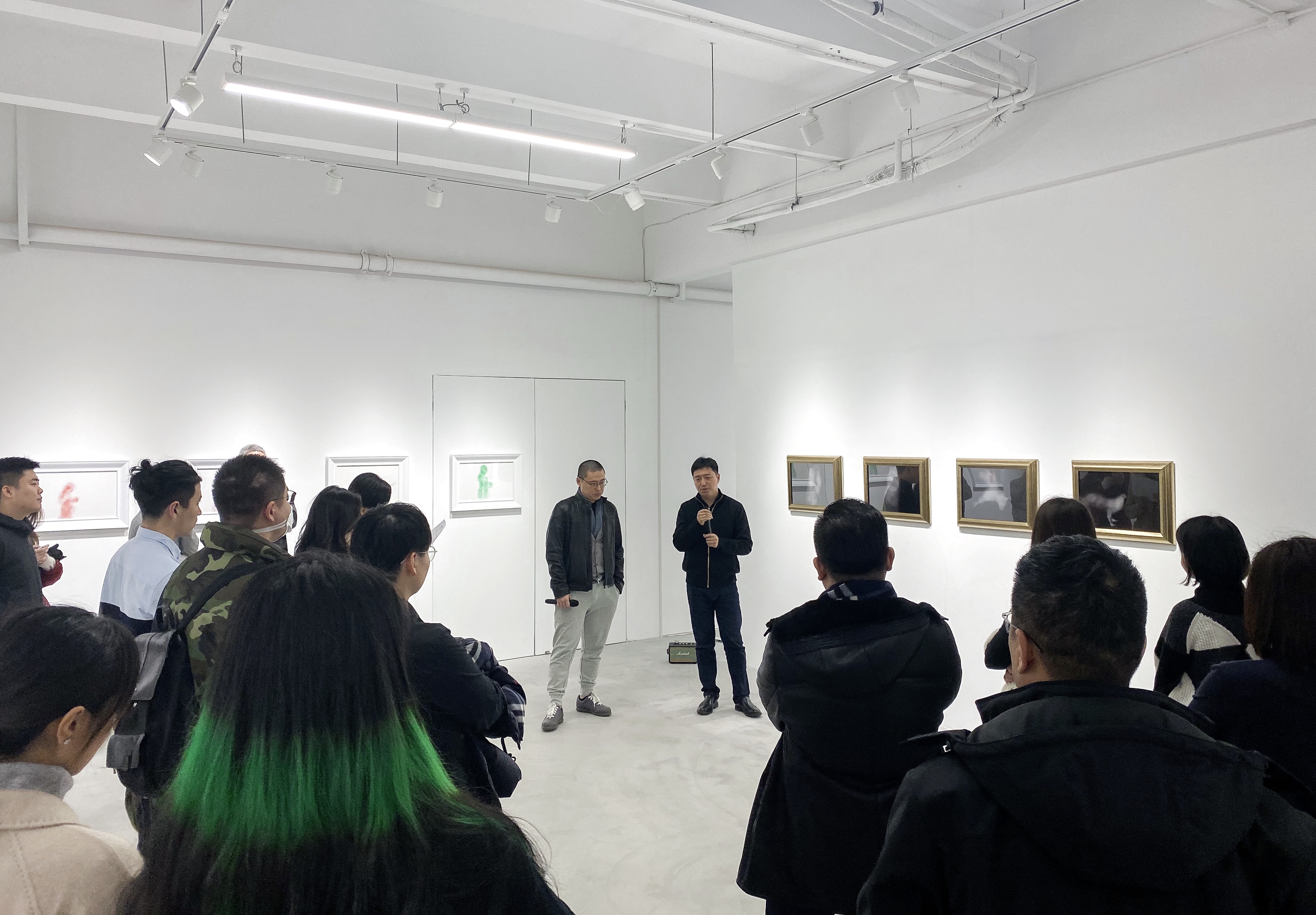 Curator Zheng Wen in discussion with Artist Sun Datang