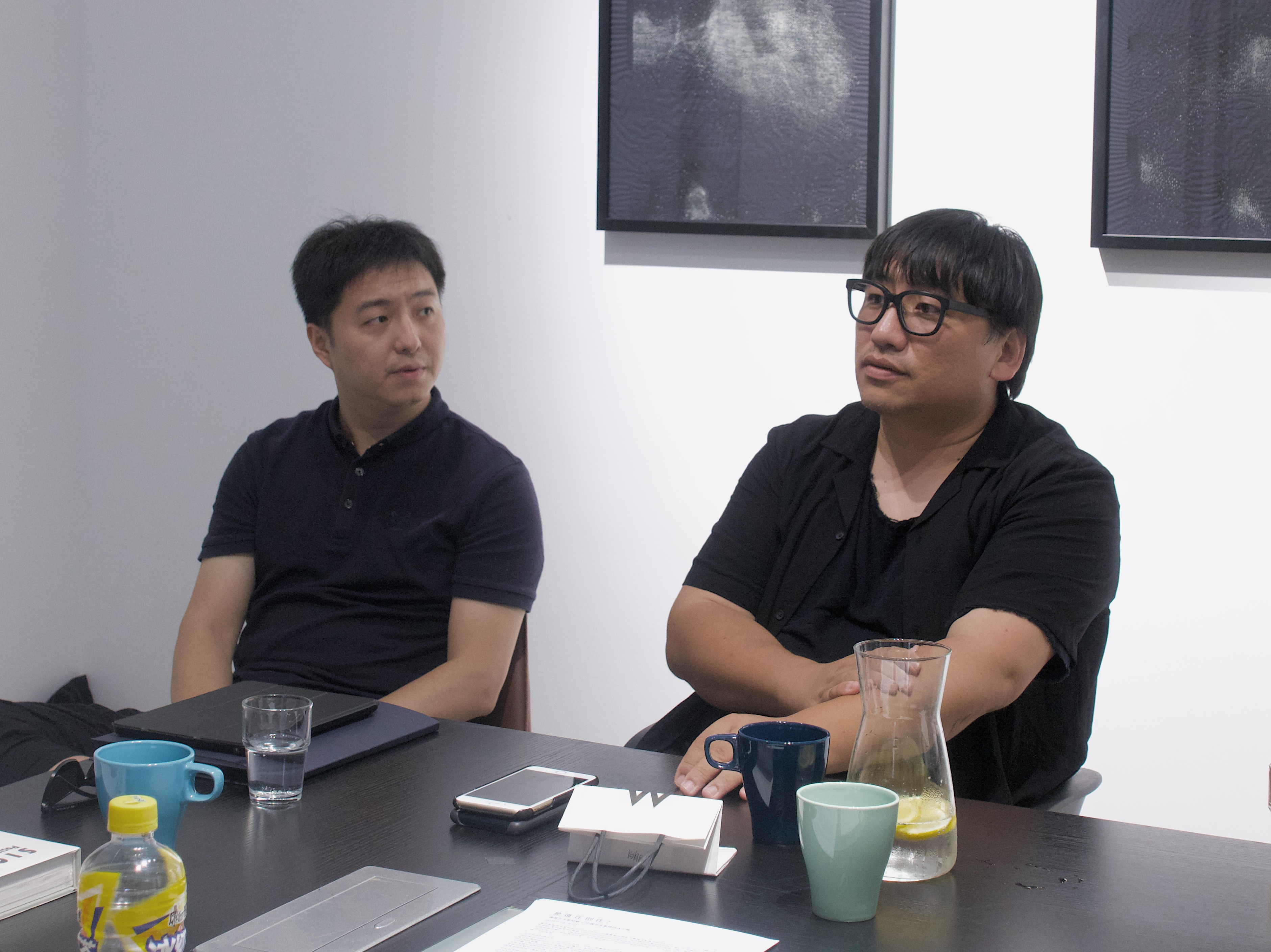 Curator Zheng Wen (left) and Curator Li Zhenhua (right)