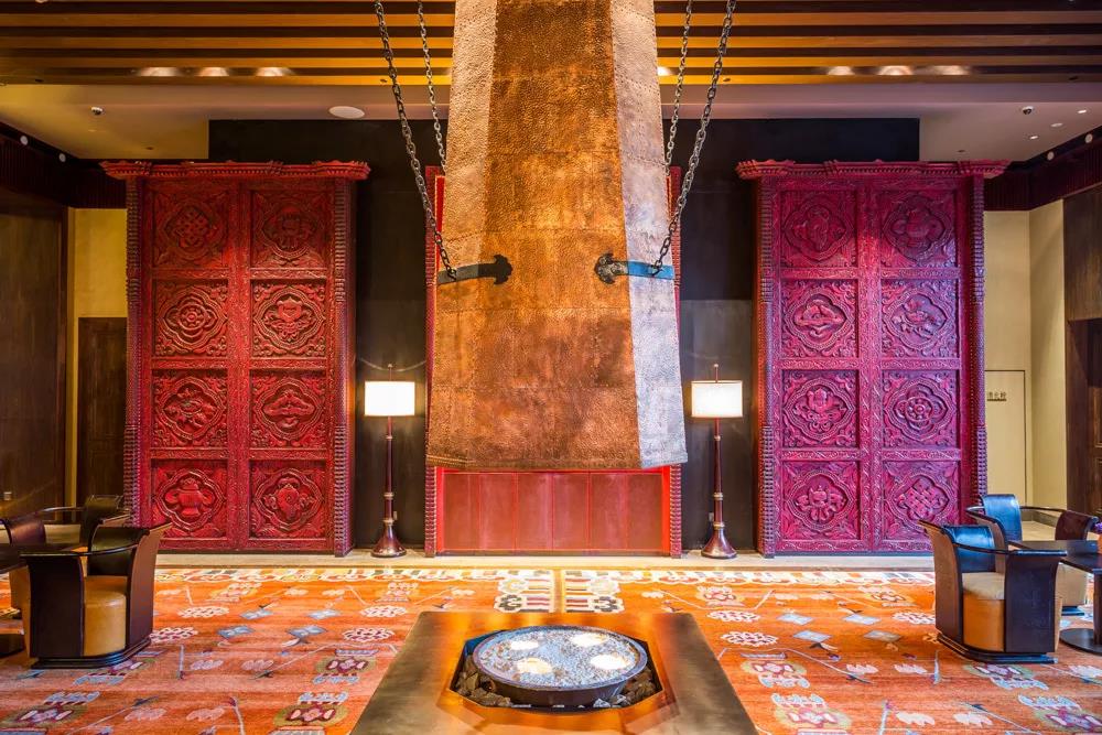 Bronze chimney and yak butter lamps in Aroma Room